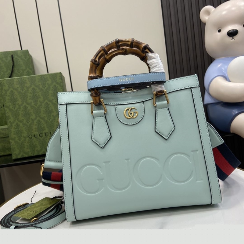 G*u*i shopping bags